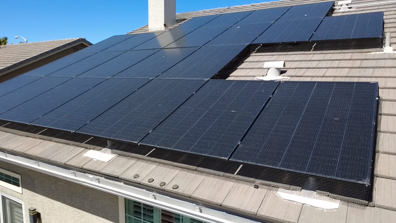 Clean residential solar array on tile roof