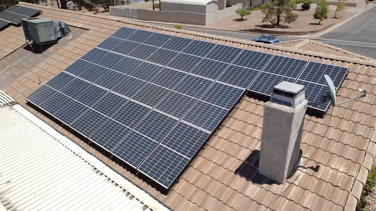 Aerial view of residential rooftop solar array