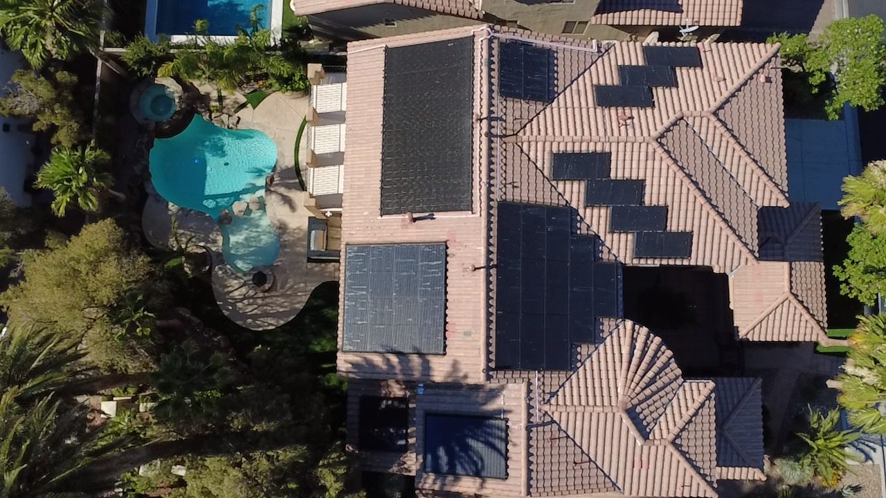 Overhead aerial of luxury Las Vegas home with pool and rooftop solar